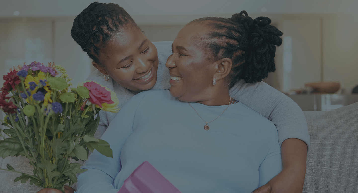 Two women smiling