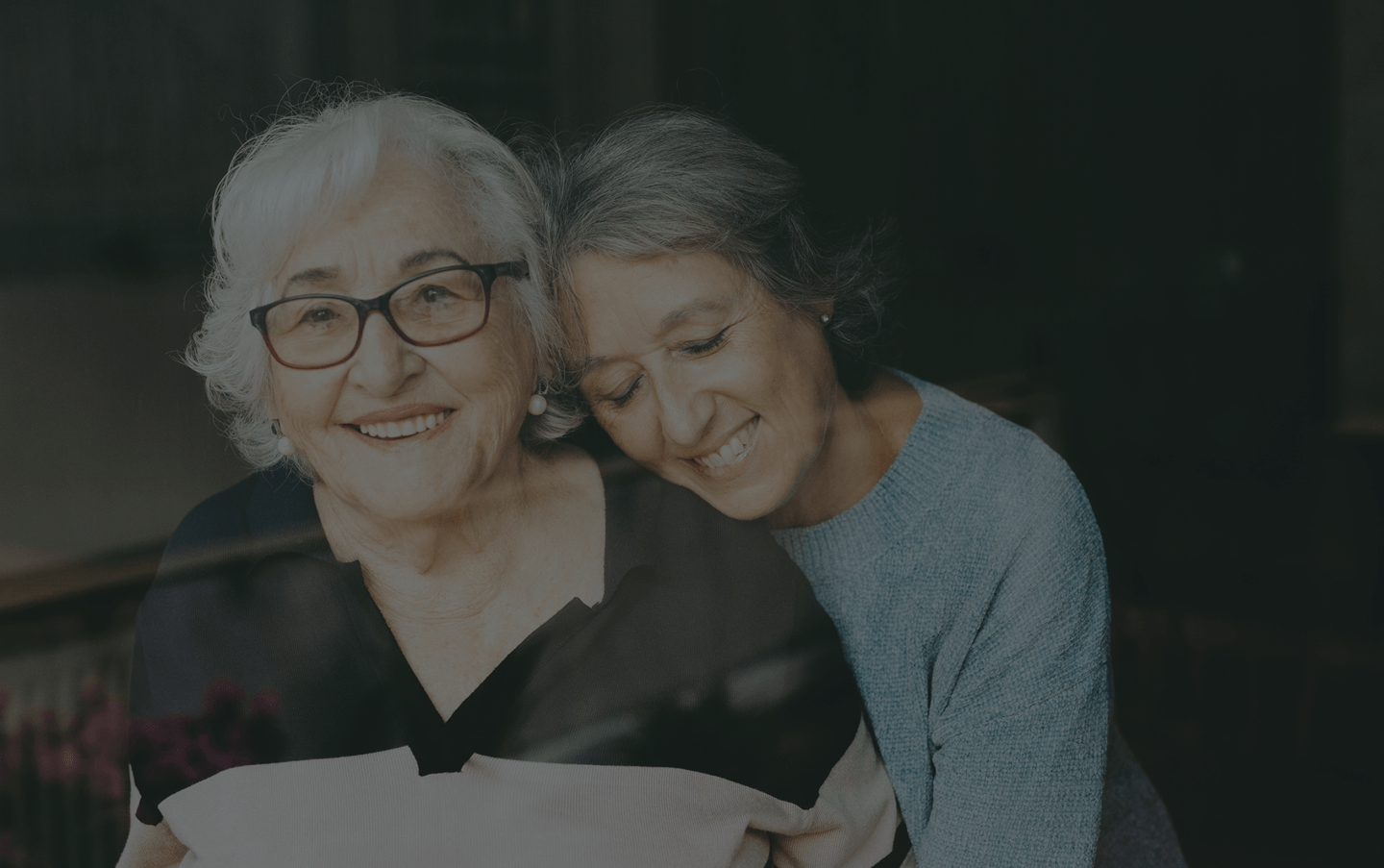 Two women smiling