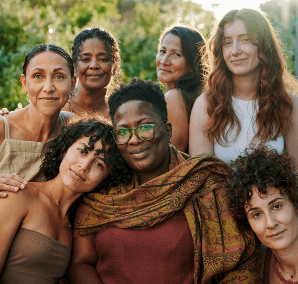 Diverse group of women smiling together