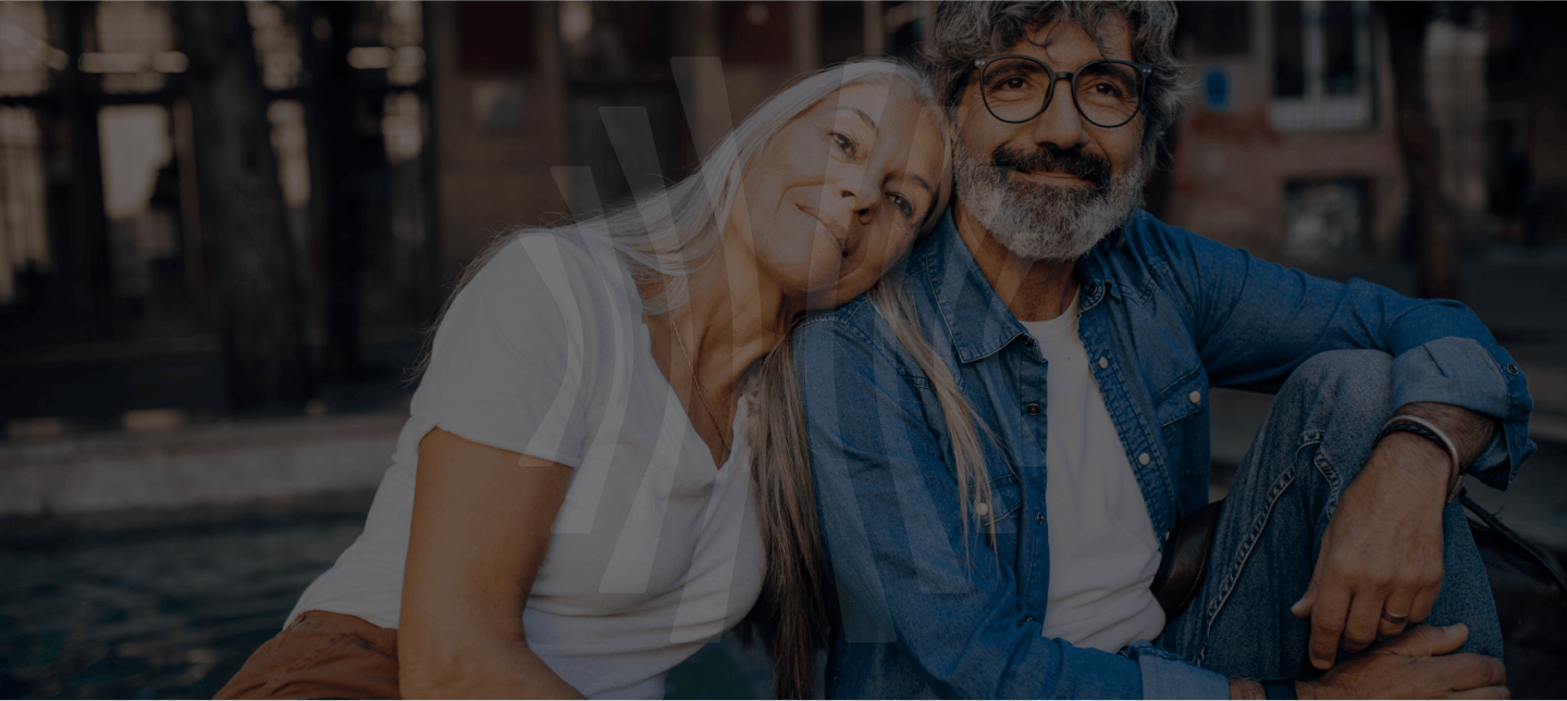 Elderly couple embracing