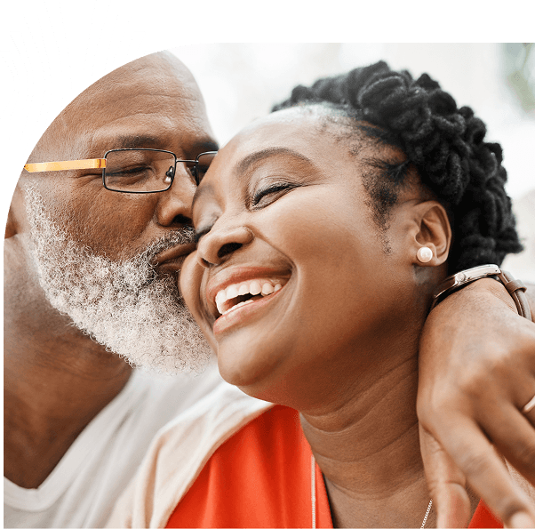 Elderly couple embracing